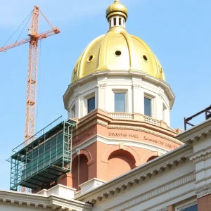 Savannah City Hall undergoing restoration with construction elements visible.