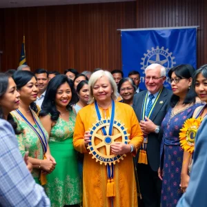 Induction ceremony of the Rotary Club of Metropolitan Savannah showing diverse members united.