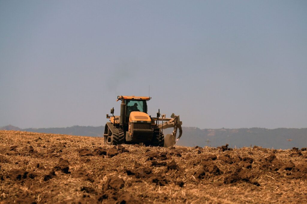 Tractor working a farm field